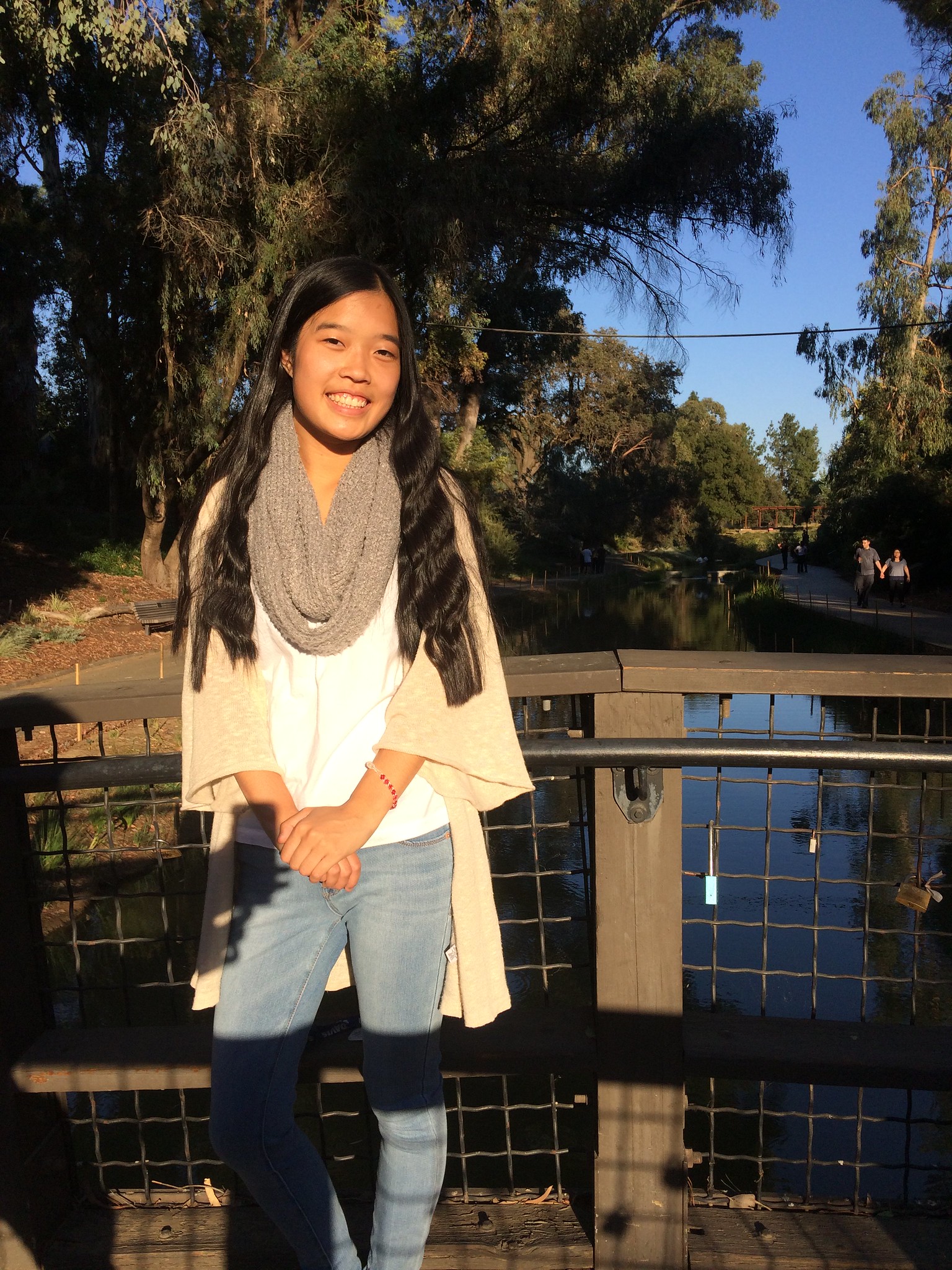 Selina Sin-yee Tung poses on a bridge in Arboretum
