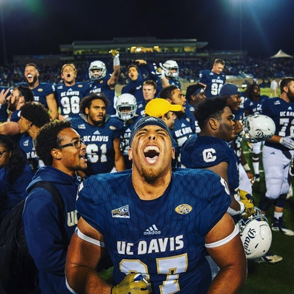Image of UC Davis Aggies football team after first Division 1 playoff game.