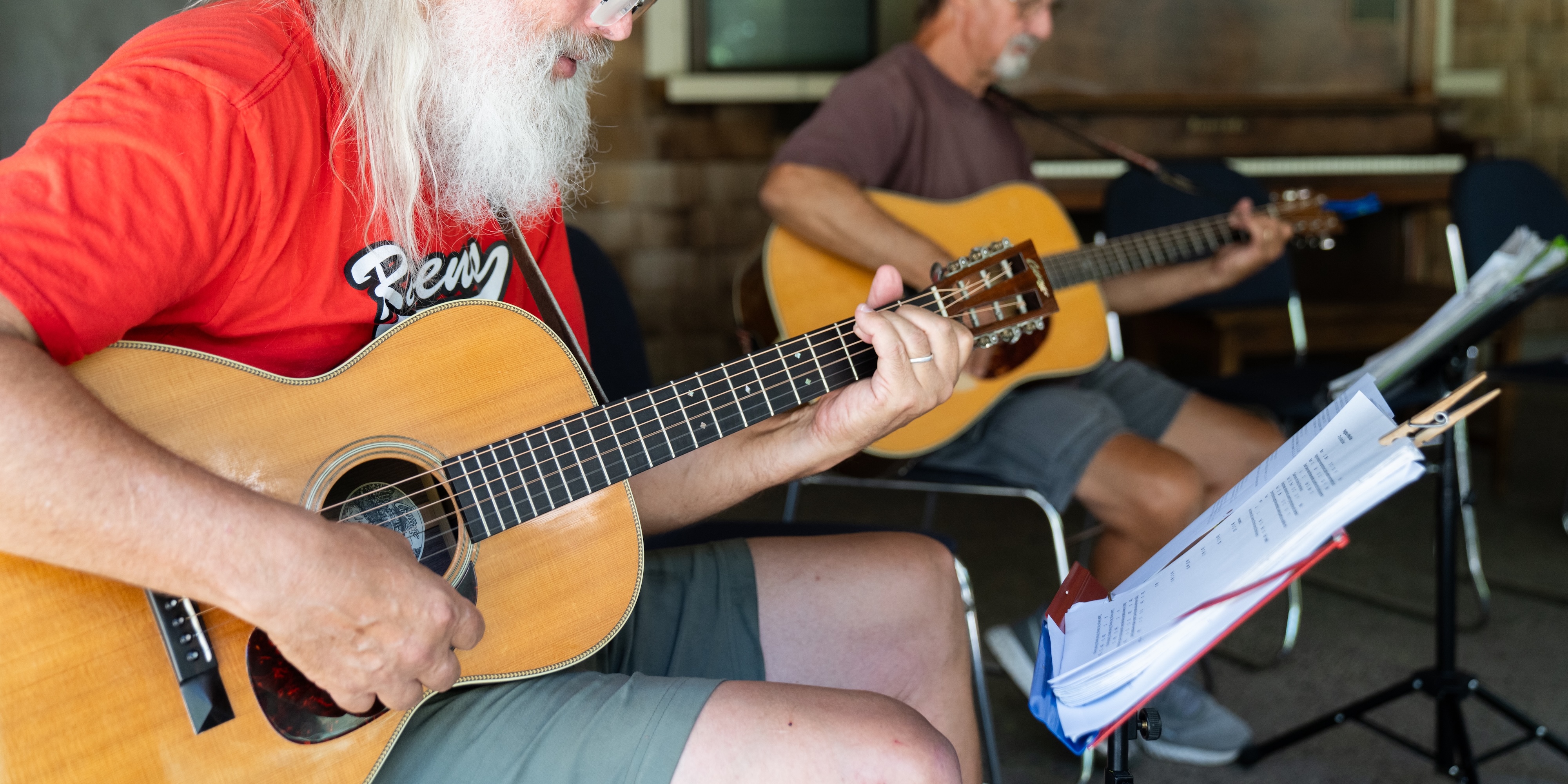 People playing guitars on Wyatt Deck