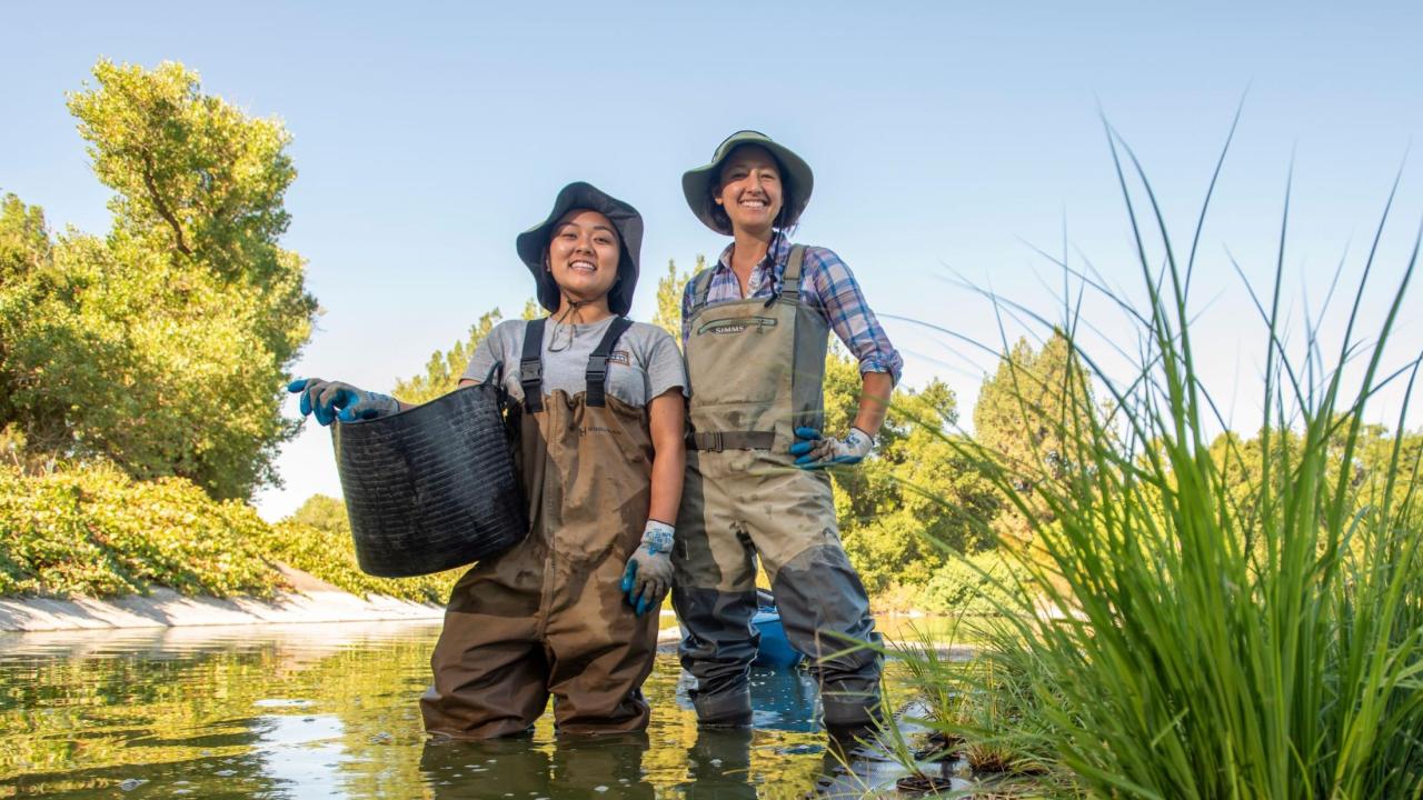 Waterway Stewardship intern Noreen Mabini (left) gains real-world experience working with her staff mentor and Waterway Steward Nina Suzuki (right) on stormwater management in urban settings. Photo of Noreen Mabini and Nina Suzuki