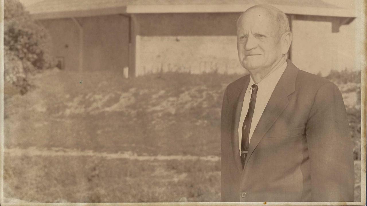 Image of Fred Wyatt in front of Wyatt Pavilion