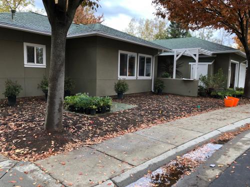 Photo of house with front lawn cleared