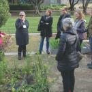 Partners from university-affiliated gardens across North America hear about the Learning by Leading™ program from student Aina Smart Truco (left).