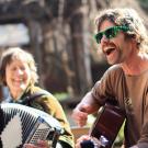 Image of the UC Davis Arboretum and Public Garden's bi-weekly folk music jam session on Wyatt Deck.