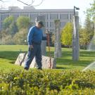 Employee working on sprinkler